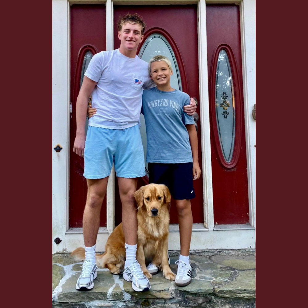 Finn McCarthy And His Brother Ollie Outside The Family Home